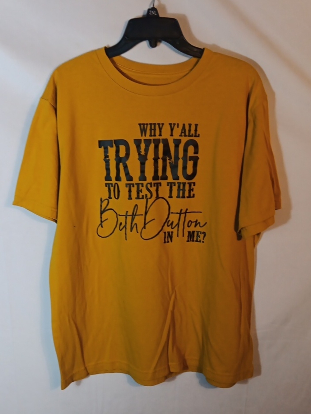 Beth Dutton Yellowstone Mustard Yellow Graphic Tee with Black Text